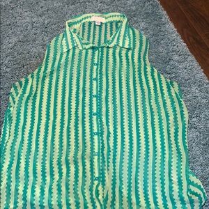 Plus size sheer sleeveless button top